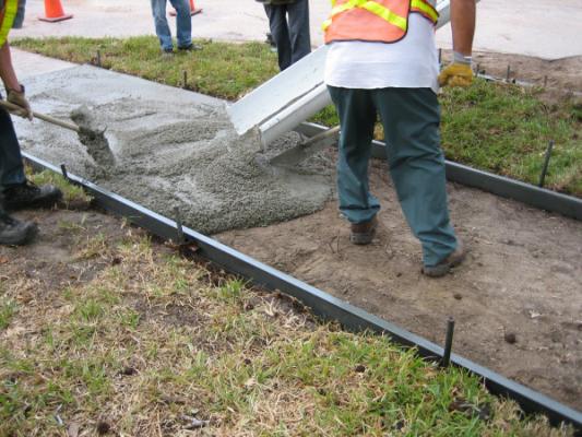 Concrete sidewalk pour using Poly Meta Forms®